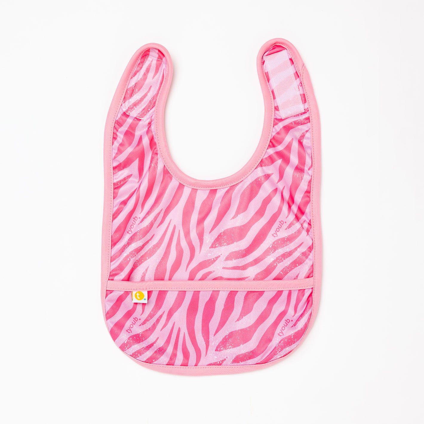 A pink baby bib with a zebra stripe pattern, featuring a front pocket and Velcro strap.