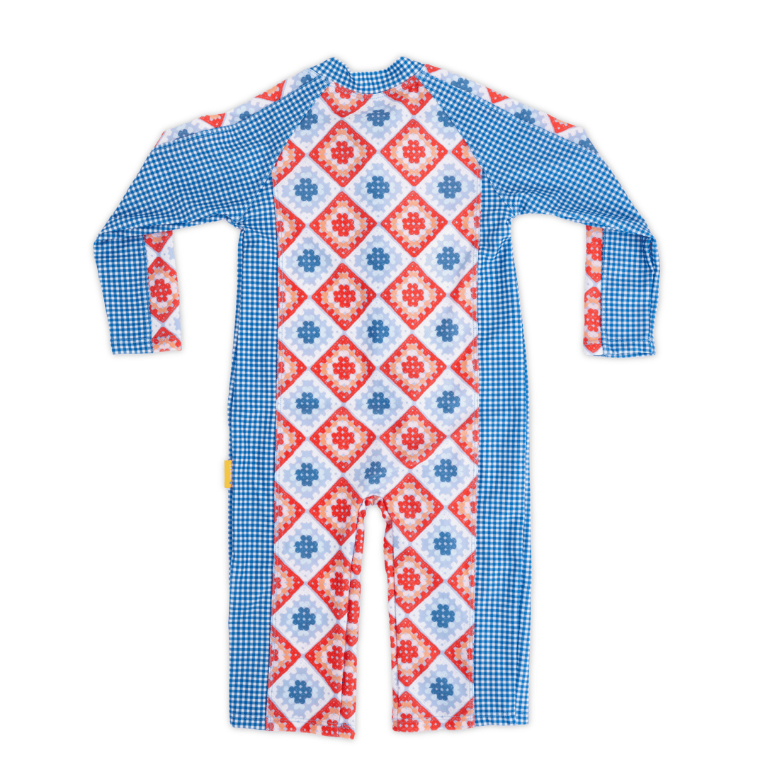 Back view of Baby long sleeve sunsuit in Modern Retro Granny Square print, full-body coverage with flatlock seams and panel design, enclosed ankle closure, crafted from recycled polyester with UPF 50+ sun protection.