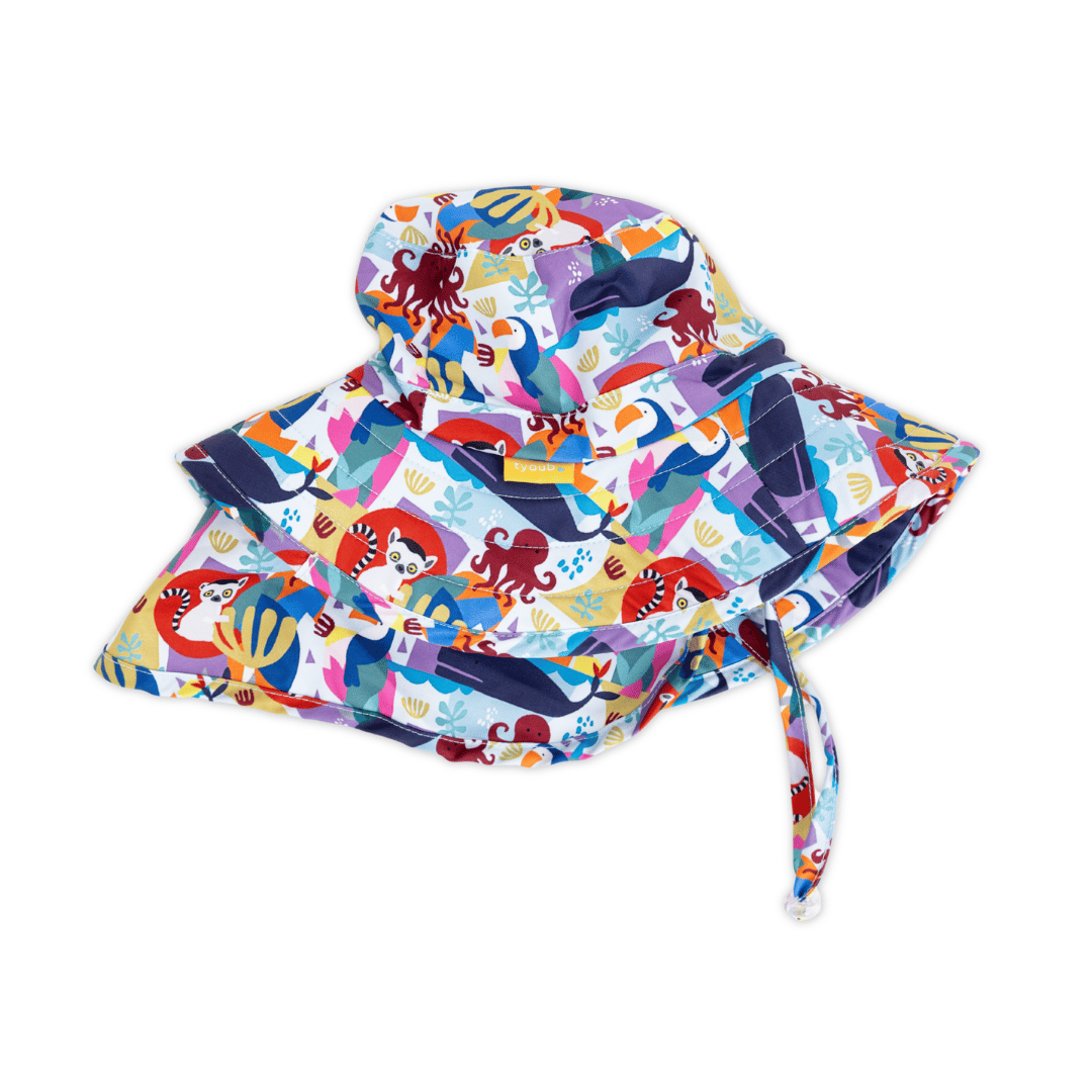 Side view of Tyoub boys’ bucket hat with extended neck flap in Animal Spirit print, broad brim for face and ear coverage, foam shape-retention brim and adjustable chin strap and break-away clip closure, sustainable recycled swim fabric.