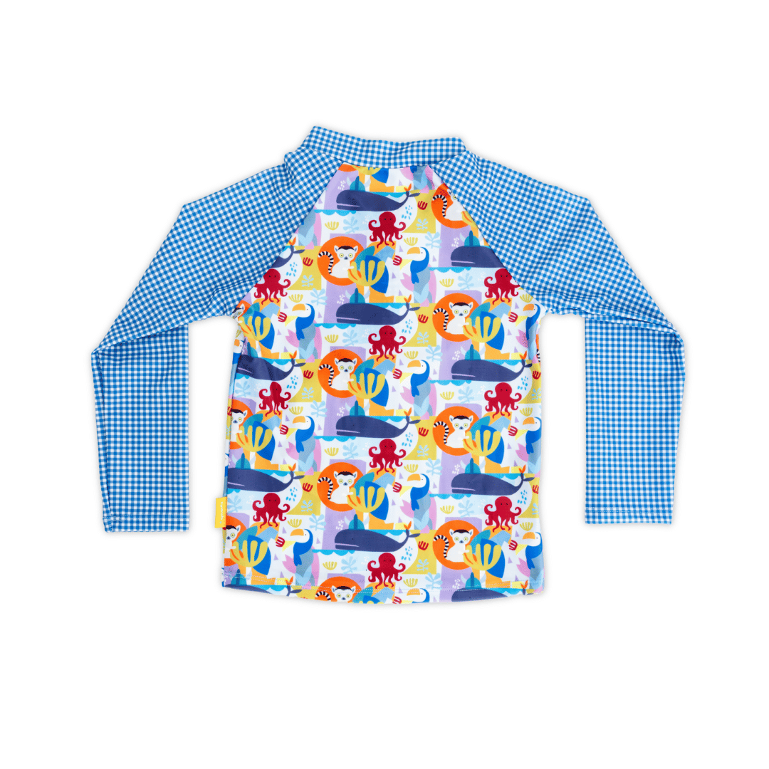 Back view of unisex kids’ long sleeve rash guard in Animal Spirit print with blue gingham raglan sleeves, high neckline and flatlock seam finish, sustainable recycled polyester swim fabric providing UPF 50+ coverage.
