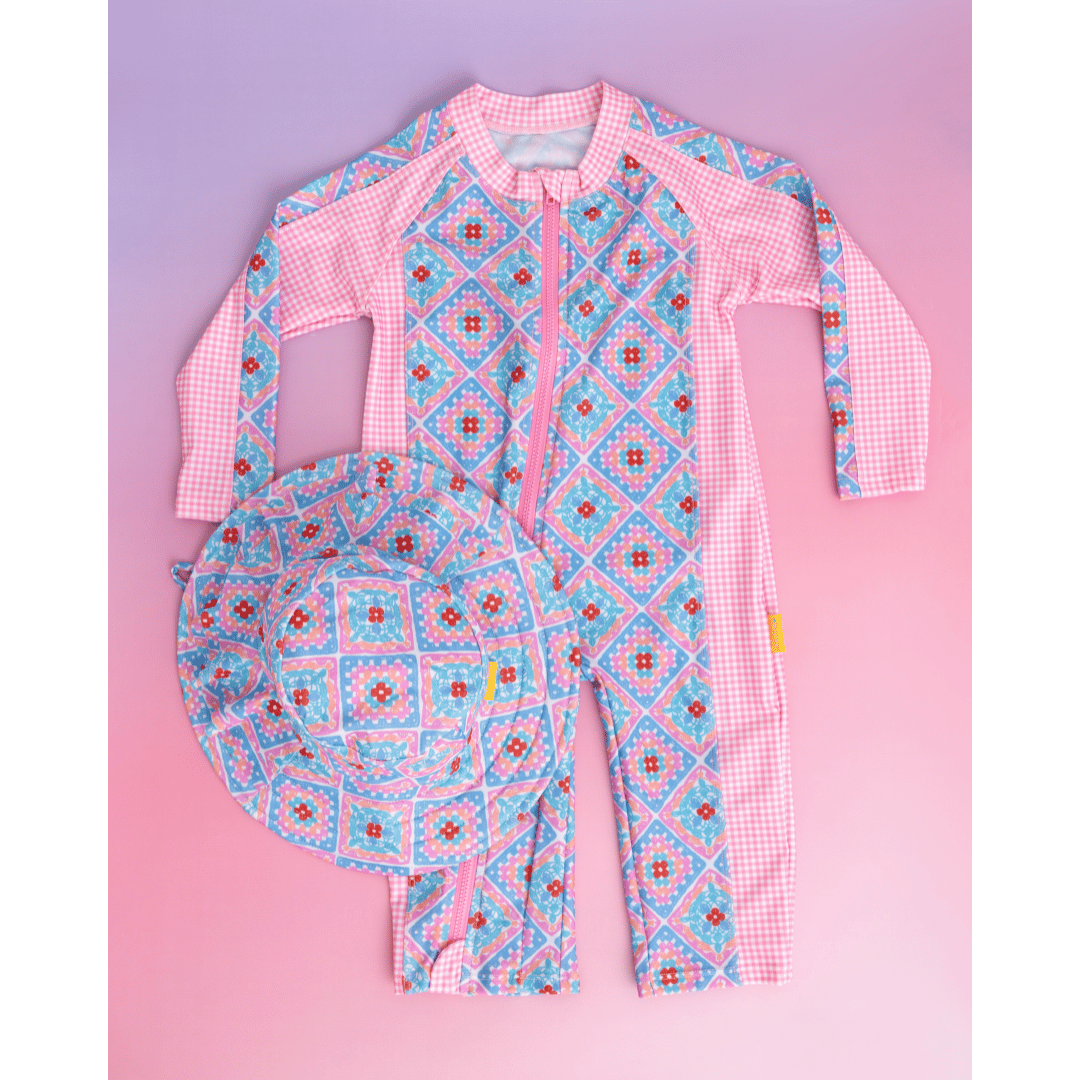 Pink Patchwork Baby Sun-Safe Zip-Up Swimsuit
Blue Patchwork Baby Full-Body Swimsuit
Gingham Pink Long Sleeve Baby Rashie Suit
Baby Girl Sun-Safe Swimsuit – checker pink
Petal Patchwork Baby All-In-One Swimsuit