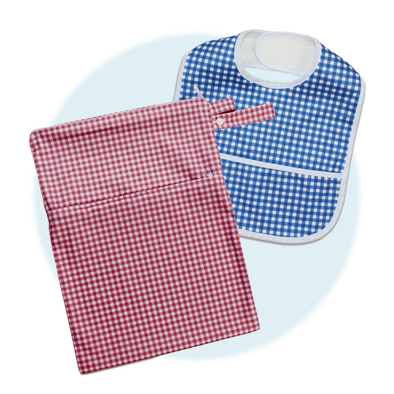 Red and white checkered wet bag and blue and white checkered bib on a light blue background
